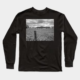 Wooden fence post in the English countryside Long Sleeve T-Shirt